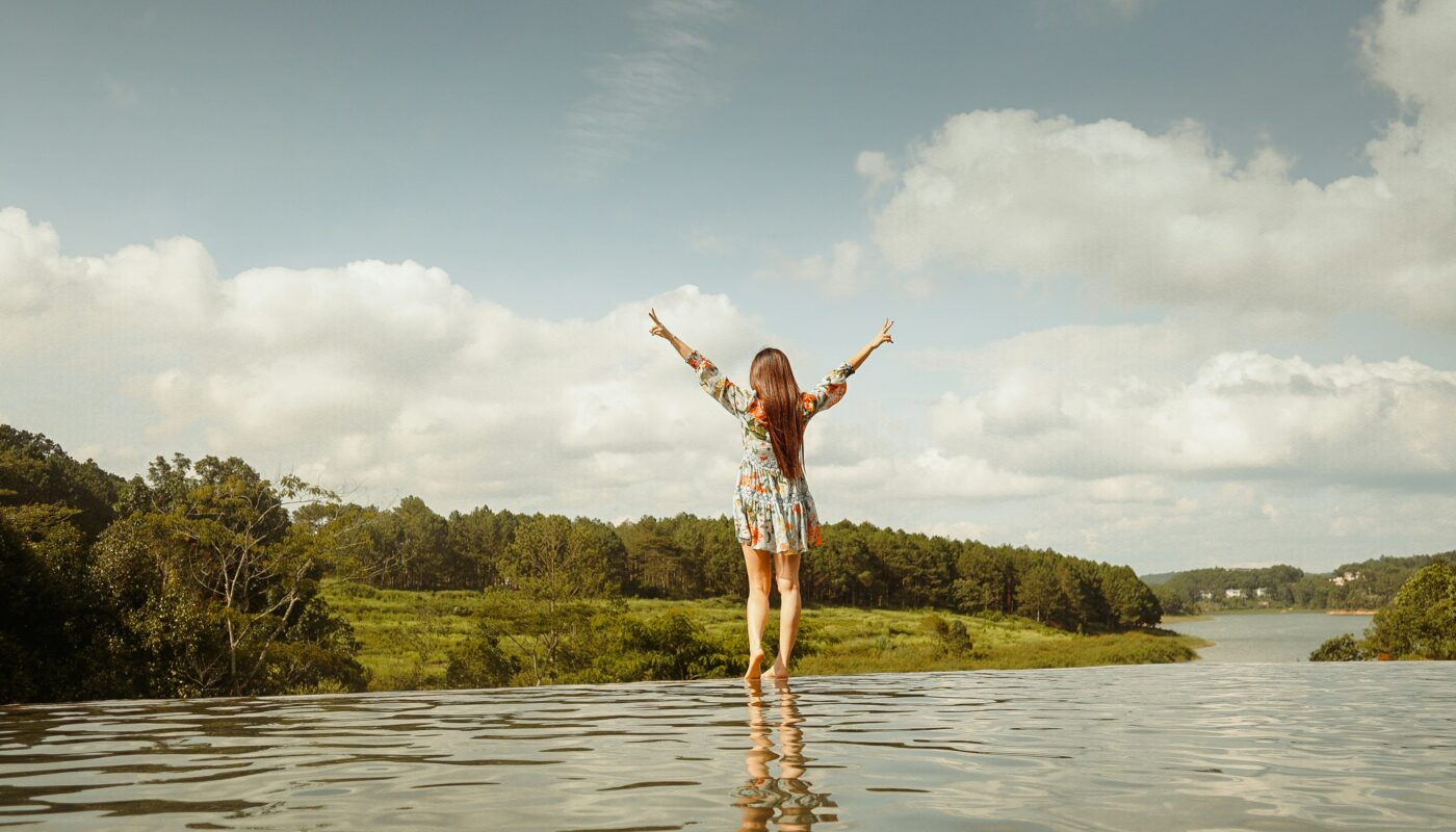 Image source: https://unsplash.com/photos/woman-in-red-and-white-plaid-shirt-and-white-shorts-standing-on-water-during-daytime-vVN_U8ir8CU