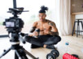 https://media.gettyimages.com/id/1160224474/photo/fitness-vlogger-making-a-video-of-himself-at-home-talking-to-camera.jpg?s=612x612&w=0&k=20&c=9nlyDizrR8nsY3yVOmJO9EOJtaPAZs9PCvyYI1b9ryo=