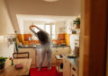 https://media.gettyimages.com/id/2247263426/photo/woman-in-polka-dot-pajamas-stretches-in-kitchen-in-morning.jpg?s=612x612&w=0&k=20&c=8mfVrFB6IQL5fiDS9c0qO8BERvOdkgRJ_Sz-e0tDPi0=