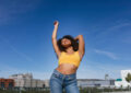 https://media.gettyimages.com/id/1217811326/photo/smiling-young-woman-dancing-with-eyes-closed.jpg?s=612x612&w=0&k=20&c=naYkyxnwhvj_vQWdfHXTdwaot2GbmmG7Nshfx7hnuUU=