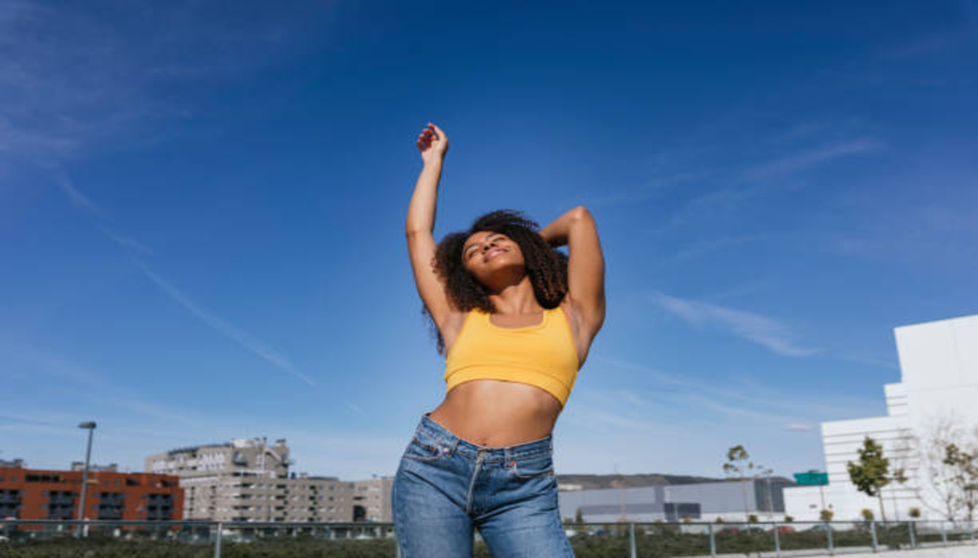 https://media.gettyimages.com/id/1217811326/photo/smiling-young-woman-dancing-with-eyes-closed.jpg?s=612x612&w=0&k=20&c=naYkyxnwhvj_vQWdfHXTdwaot2GbmmG7Nshfx7hnuUU=