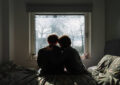 https://media.gettyimages.com/id/2205094626/photo/powerful-rear-view-shot-of-a-mature-couple-sitting-on-their-bed-as-the-morning-sun-streams-in.jpg?s=612x612&w=0&k=20&c=lPpxT_q7PGVQvO3G3GnavFA6BFBXGOOmzM79j7c7wWM=