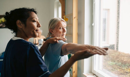 https://media.gettyimages.com/id/2224658946/photo/female-therapist-helping-senior-woman-with-stretching-exercise-at-rehabilitation-center.jpg?s=612x612&w=0&k=20&c=BpxKD8bxcrpva_r5U7_DzJwqMhZD7GskGh3MwGLVZfk=