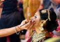 https://media.gettyimages.com/id/2268626091/photo/new-delhi-india-a-bride-getting-ready-during-mass-wedding-organised-by-ladli-foundation-in.jpg?s=612x612&w=0&k=20&c=O-7LuGamE8HfQ3AYnMLQXmkkLs9HgBzPXtzuXXGNk3M=lo