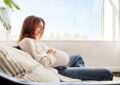 https://media.gettyimages.com/id/2238016743/photo/pregnant-woman-relaxing-on-sofa-near-window-at-home.jpg?s=612x612&w=0&k=20&c=CBhQXq1ah8fjxSRvqWsWl0ZSNop0FvHXDsSg2RgZo9A=