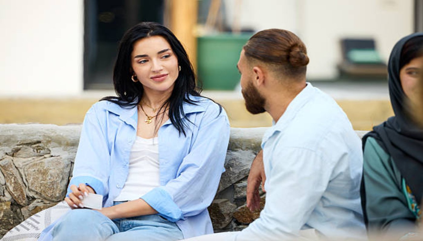 https://media.gettyimages.com/id/2283272790/photo/woman-looking-at-her-male-friend-while-sitting-outdoors.jpg?s=612x612&w=0&k=20&c=oTwP4YzZcOaZzgeb_pYjUADJqrDB0FwrrsQHqURxm5I=