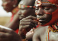 https://media.gettyimages.com/id/10193338/photo/masai-warrior-applying-face-paint-close-up-kenya.jpg?s=612x612&w=0&k=20&c=jjODEi4ZiiWmx0QVjQ9Ud8908dtCK6tCs4SAqrB0YnA=