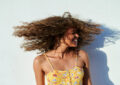 https://media.gettyimages.com/id/1634119719/photo/portrait-of-woman-moving-her-curly-hair-in-front-of-white-wall.jpg?s=612x612&w=0&k=20&c=_qG8B_O_KrnZM0bfaHFzpPmpeLCVAJMC5vH-oNvOa40=