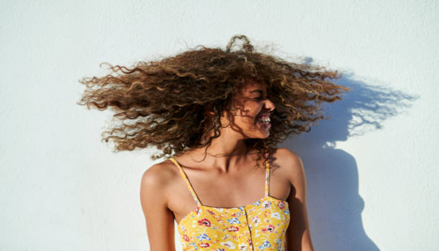 https://media.gettyimages.com/id/1634119719/photo/portrait-of-woman-moving-her-curly-hair-in-front-of-white-wall.jpg?s=612x612&w=0&k=20&c=_qG8B_O_KrnZM0bfaHFzpPmpeLCVAJMC5vH-oNvOa40=